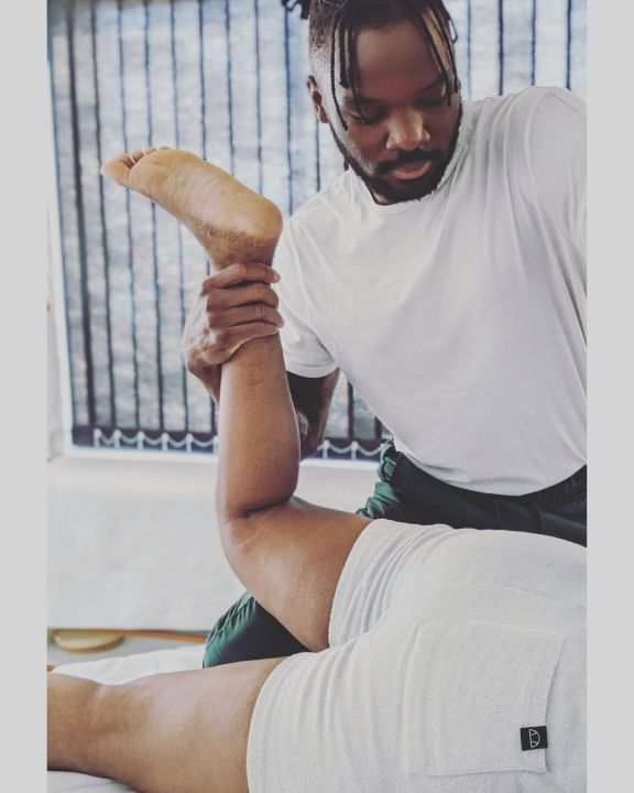 Lee performing sports massage treatment in Coventry